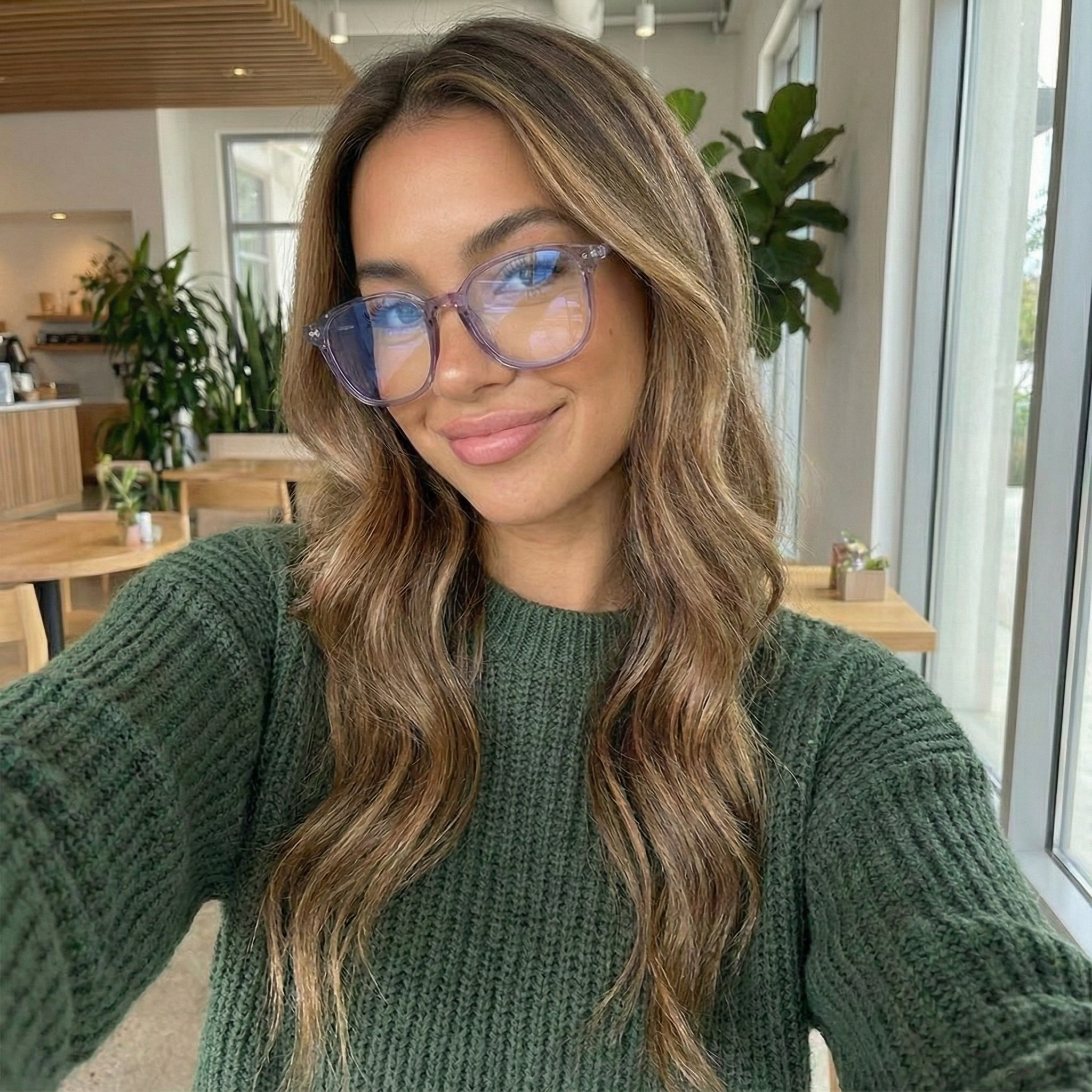 Model wearing ØBSERV glasses