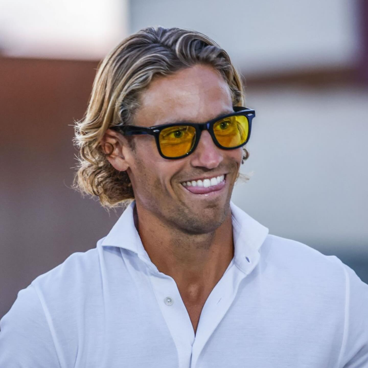 Marcos Llorente wearing blue-light filtering glasses